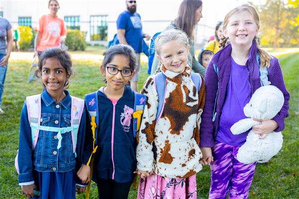 Students walking to school for National Walk to School Day.